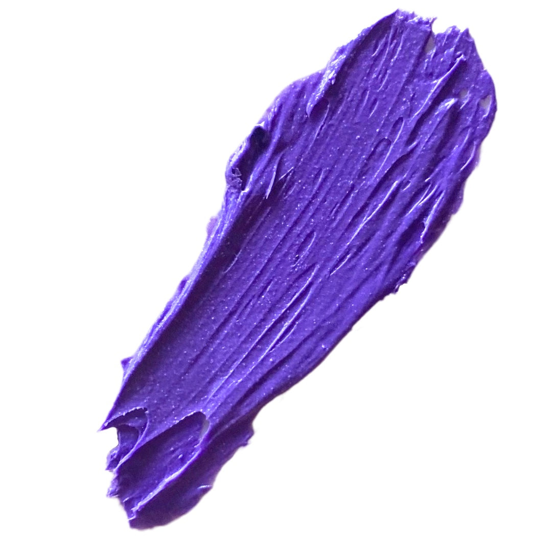 Violet purple mascara smear on white background
